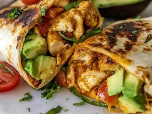 Ingredients for Chicken Avocado Wrap on a wooden board