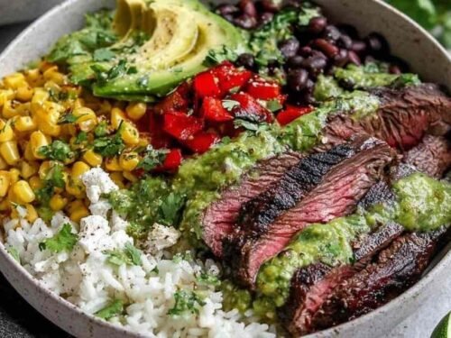 Grilling marinated flank steak for Cilantro Lime Steak Bowls