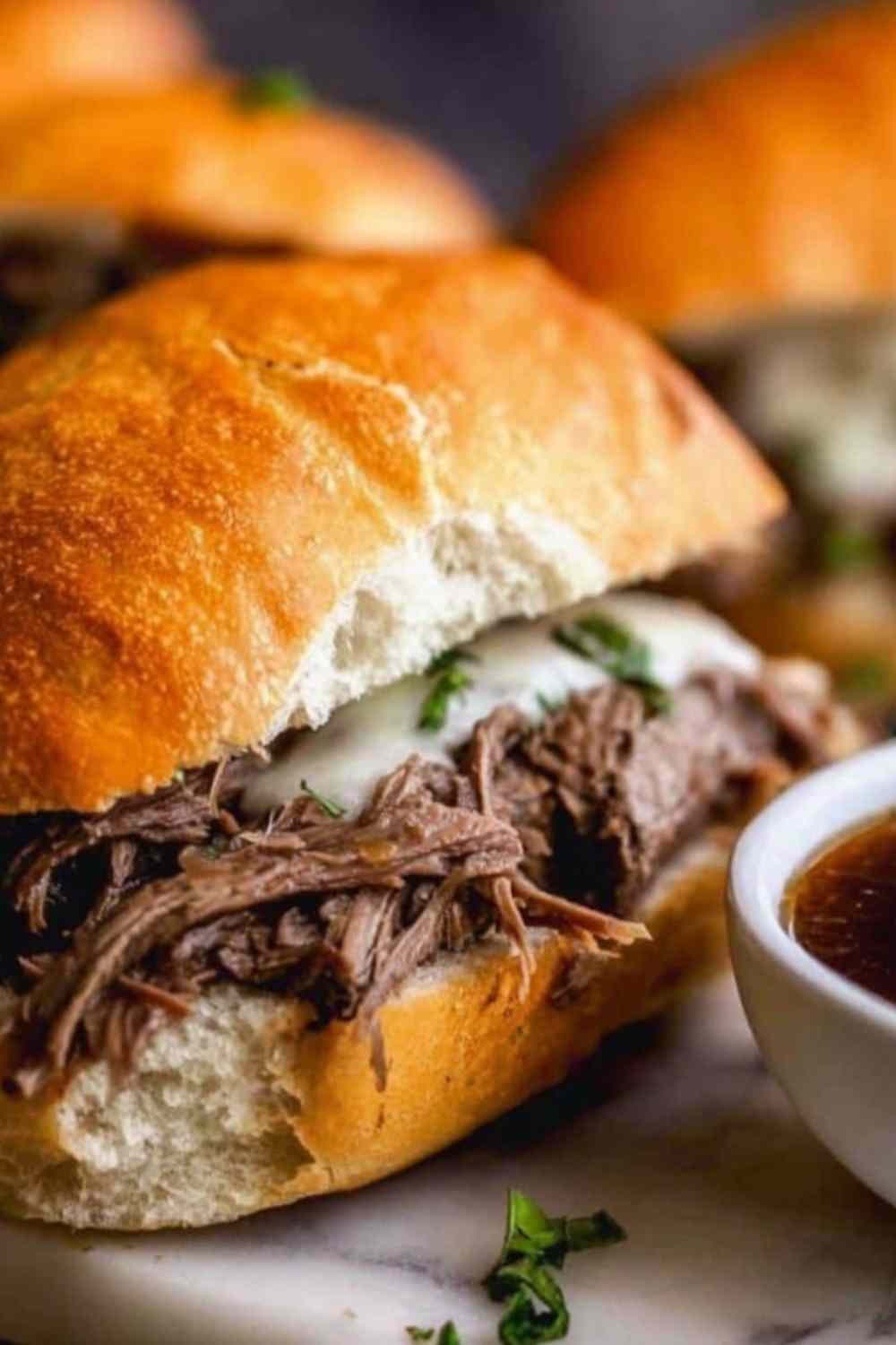 Shredded beef for Tender Instant Pot French Dip Sandwiches in Instant Pot