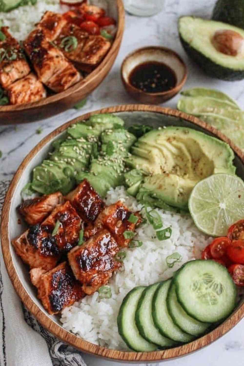 Spicy Salmon Bowl Recipe salmon cooking in a skillet with glaze