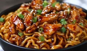 Sticky Garlic Chicken Noodles Sticky Garlic Chicken Noodles Recipe served in a bowl