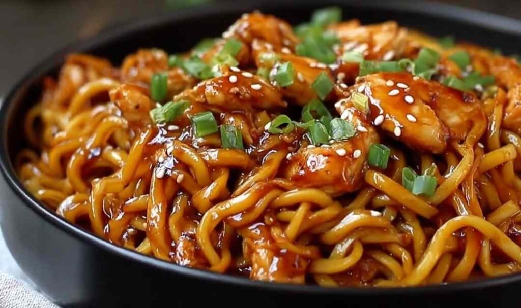Sticky Garlic Chicken Noodles Recipe served in a bowl
