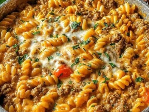 Stovetop Creamy Ground Beef Pasta cooking in a skillet