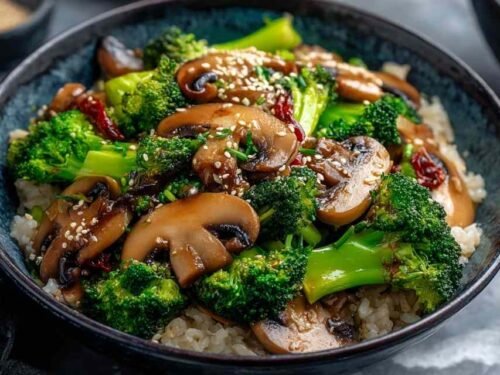 Fresh broccoli florets and sliced mushrooms prepped for a broccoli and mushroom stir fry