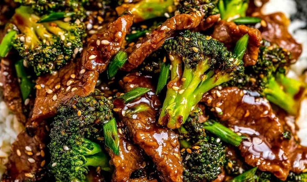 Sizzling Beef and Broccoli in a cast iron skillet