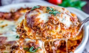 Ingredients for easy ravioli lasagna including frozen ravioli and sausage