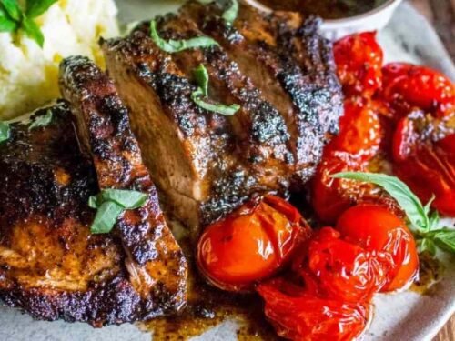 Chicken pieces resting in a balsamic grilled chicken marinade inside a plastic bag