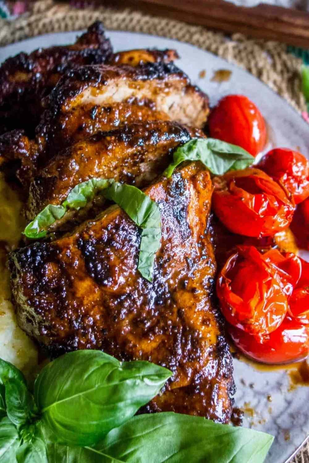 Chicken pieces resting in a balsamic grilled chicken marinade inside a plastic bag