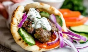 Raw meat mixture for homemade gyros recipe in a bowl